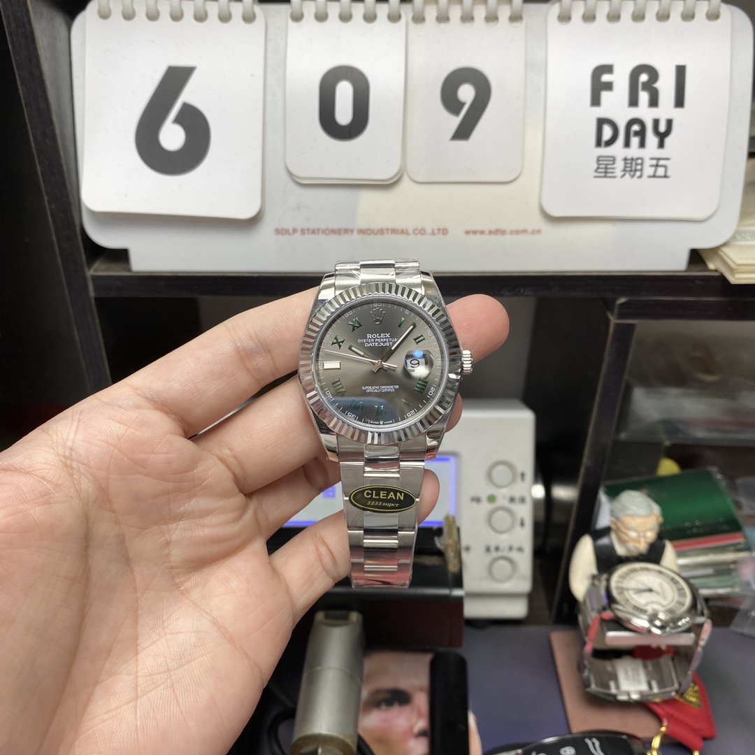 Rolex Datejust series m126334-0021, Grey Dial Green Roman Numerals, 41mm size. Oyster strap